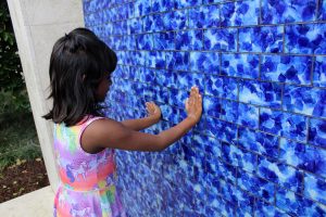 Girl Playing in the Water Wall